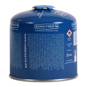 Cadac 500g gas cartridge next to a camping stove at a campsite